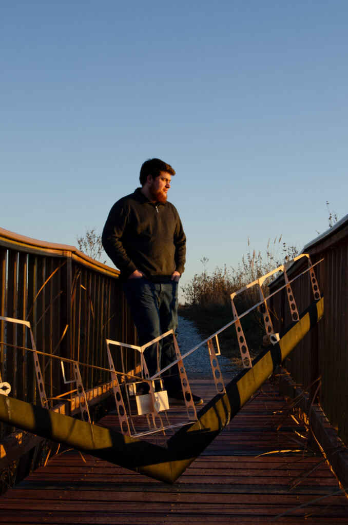 Farm Eagle drone prototype sitting on a bridge with the company founder in the background